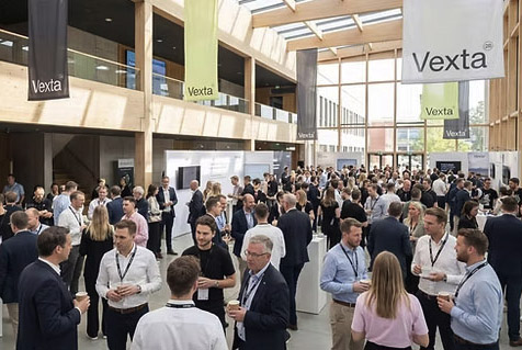 Attendees mingling at a conference venue