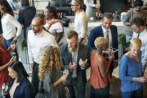 Group of people networking at an event