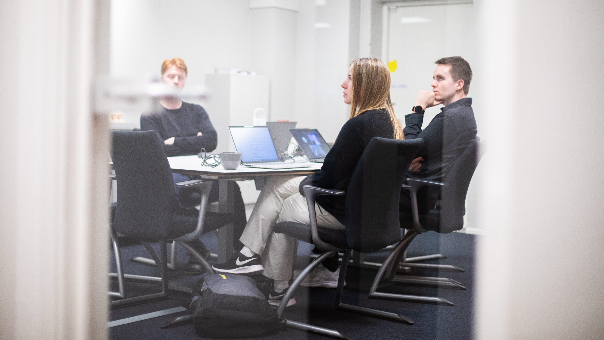 Team in a meeting analysing operational data
